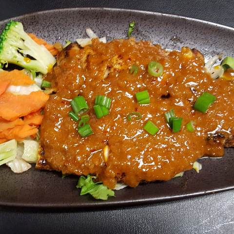 Grilled Spicy Chicken Topped with Peanut Sauce, photographed