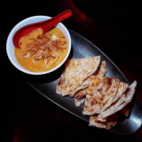 Roti Served with curry, photographed